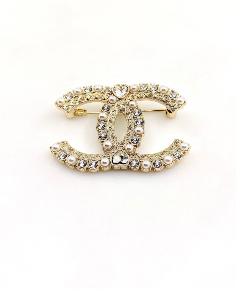 Ch**el brooches